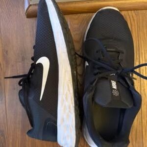 Size 12 Woman’s Nike Running Shoes